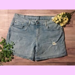 Levi’s blue distressed high waisted denim shorts
